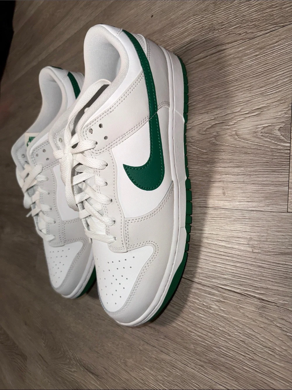 Nike White Low-Top Sneakers with Green Swoosh